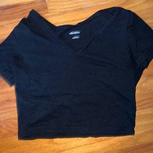 Black short sleeve crop v neck size Large.